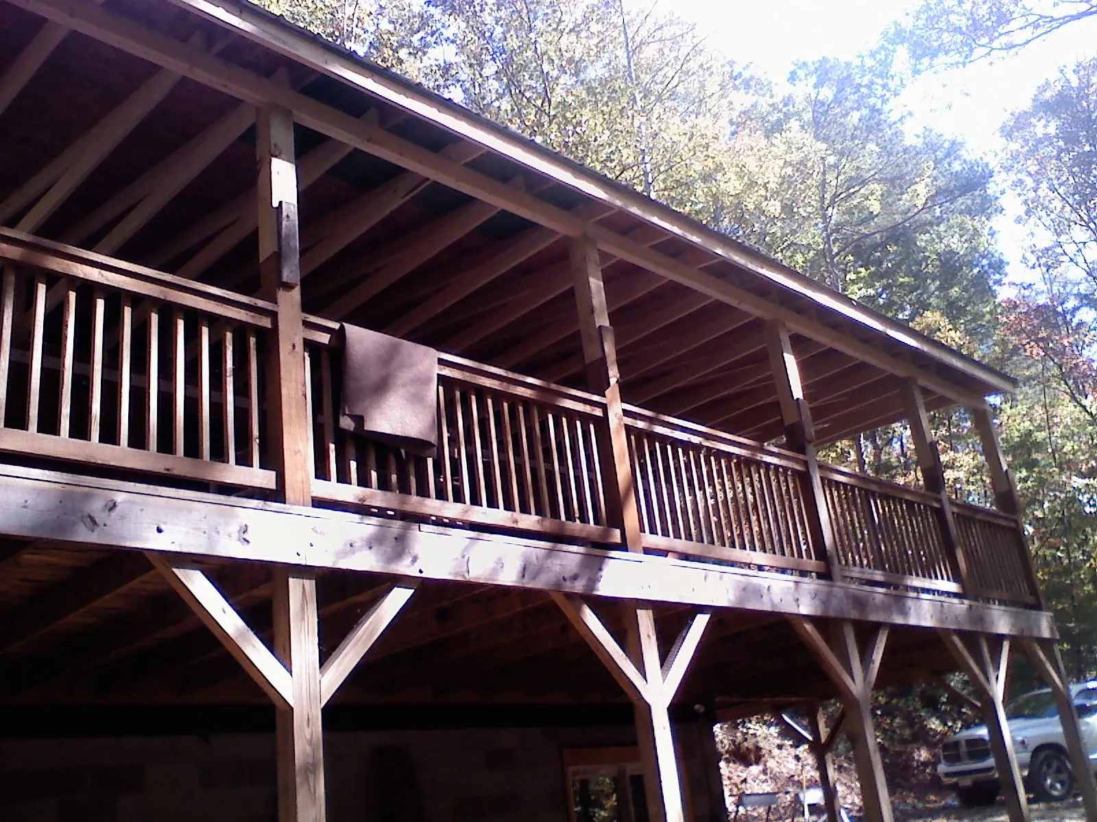 Timber framing under a new elevated porch and deck — Roof Leak Repair in Dike by Roofing Brothers